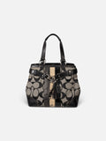 Coach tote vintage en toile Signature