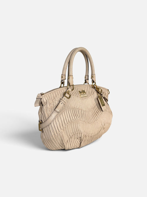 Coach satchel vintage en cuir plisse beige