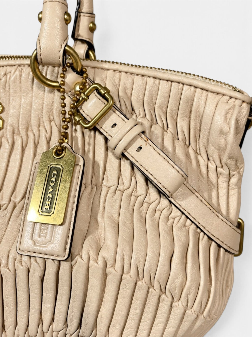 Coach satchel vintage en cuir plisse beige